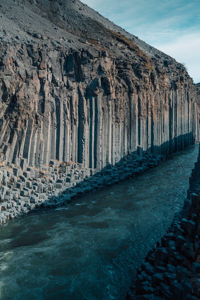 majestic-basalt-columns-along-icelandic-river-32617994